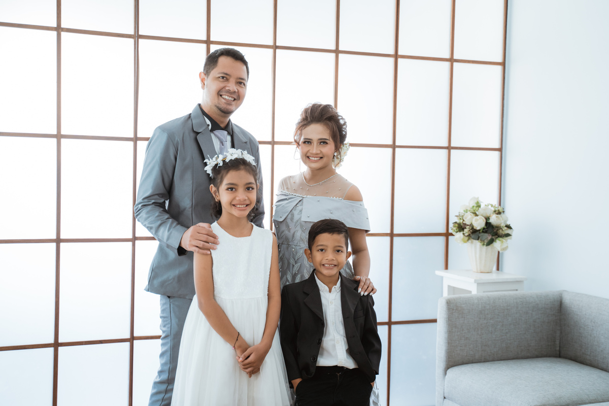 Portrait of a Happy Family with Modern Clothes. Family Photo Concept